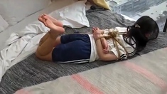 Asian Girl hogtied