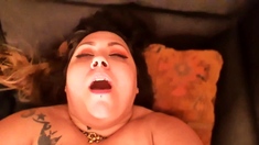 Busty curly brunette with big boobs fucks on couch