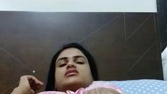 Dorothy Black and Britney use the toy