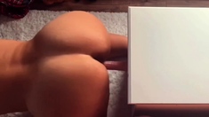 Big-Assed MILF Masturbates with Dildo for Intense Orgasm on