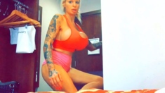 Beautiful blond babe with big boobs masturbating