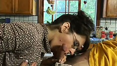 Luscious mom seduces her son's friend and fucks his cock in the kitchen