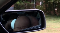 Black slut sucking dick in front seat of car